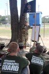 Sgt. 1st Class Alec Donahoe, a drill sergeant with the Mississippi Army National Guard's Recruiting and Retention Battalion, teaches squad movement tactics to newly enlisted Mississippi Army Guard Soldiers assigned to the Recruit Sustainment Program, Oct. 7, 2017, in Senatobia, Miss.
