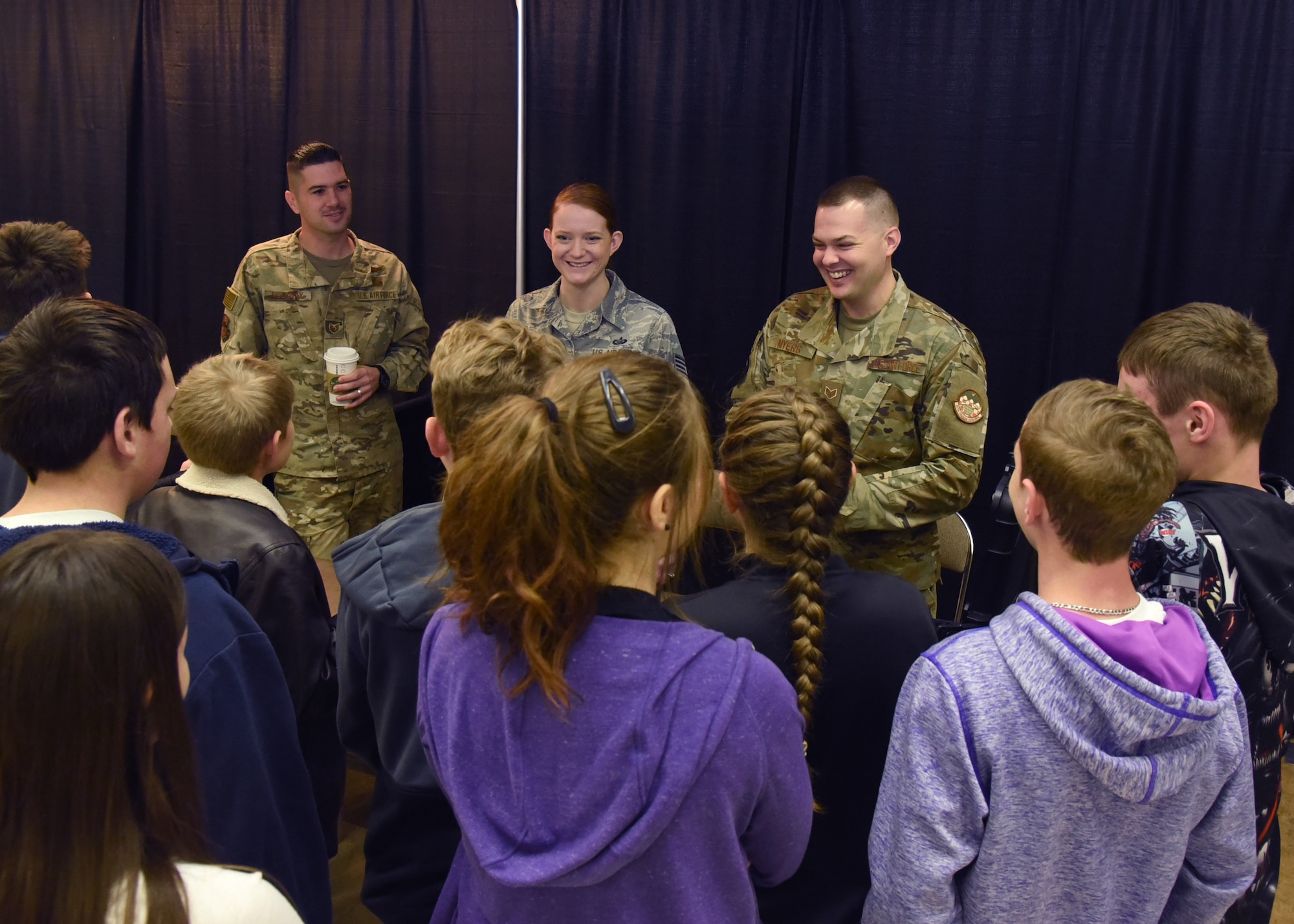 U.S. Air Force members answer questions from students of the Water Valley Independent School District at the youth career fair, Careers Y’all, at the McNease Convention Center, in San Angelo, Texas, March 6, 2019. The military members volunteered their time to showcase their career fields and mentor youth. (U.S. Air Force photo by Airman 1st Class Abbey Rieves/Released)