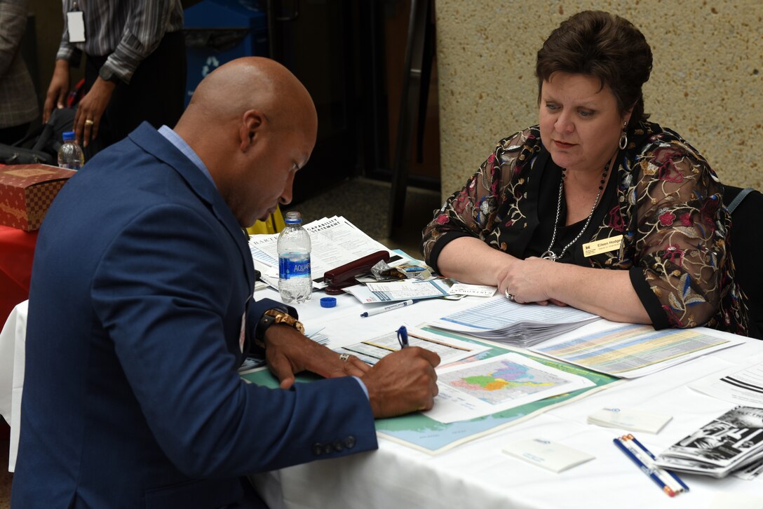 Eileen Hodges, U.S. Army Corps of Engineers Huntington District deputy for Small Business, provides contracting forecast info to Craig Stevens, president of Genesis 360 Construction in Baton Rouge, La., during the 9th Annual Small Business Industry Day March 6, 2019 at Tennessee State University’s Avon Williams Campus in Nashville, Tenn. (USACE photo by Lee Roberts)