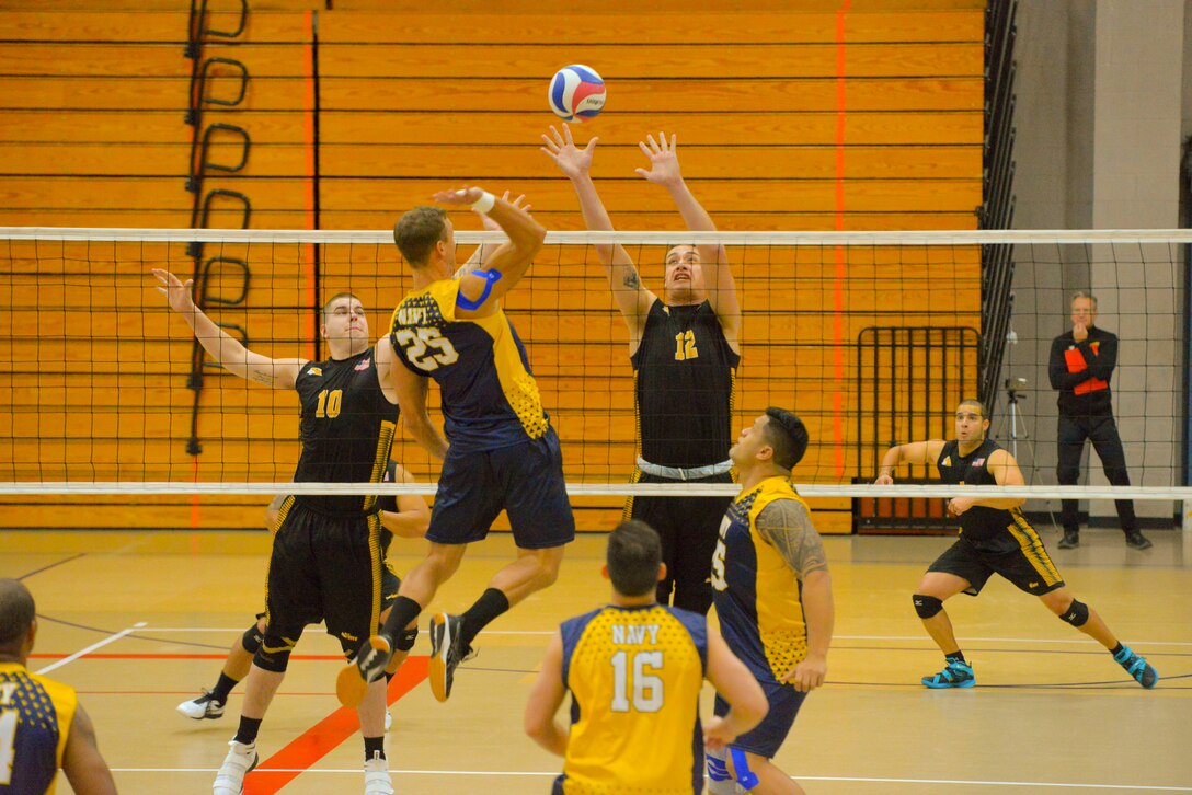 Elite U.S. military volleyball players from around the world compete for dominance at Fort Bragg's Ritz Epps Physical Fitness Center March 6-8, 2019 to determine the best of the best at the 2019 Armed Forces Volleyball Championship. Army, Navy (with Coast Guard) and Air Force teams squared off at the annual AFVC through three days of round-robin competition, to eventually crown the best men and women volleyball players in the military. U.S. Navy photo by Mass Communications Specialist 1st Class John Benson (Released)