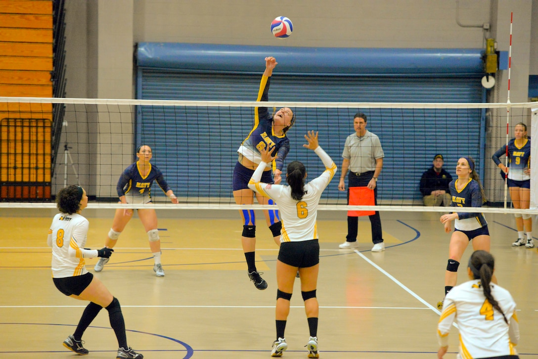 Elite U.S. military volleyball players from around the world compete for dominance at Fort Bragg's Ritz Epps Physical Fitness Center March 6-8, 2019 to determine the best of the best at the 2019 Armed Forces Volleyball Championship. Army, Navy (with Coast Guard) and Air Force teams squared off at the annual AFVC through three days of round-robin competition, to eventually crown the best men and women volleyball players in the military. U.S. Navy photo by Mass Communications Specialist 1st Class John Benson (Released)