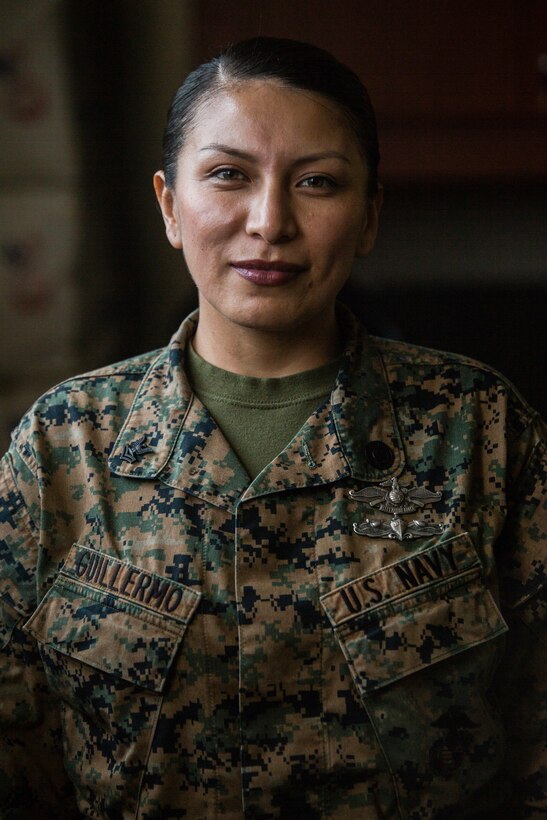 Petty Officer 2nd Class Nancy Guillermo, a religious program specialist with 1st Marine Aircraft wing, stands at attention on Camp Foster, Okinawa, Japan, Feb. 5, 2019.