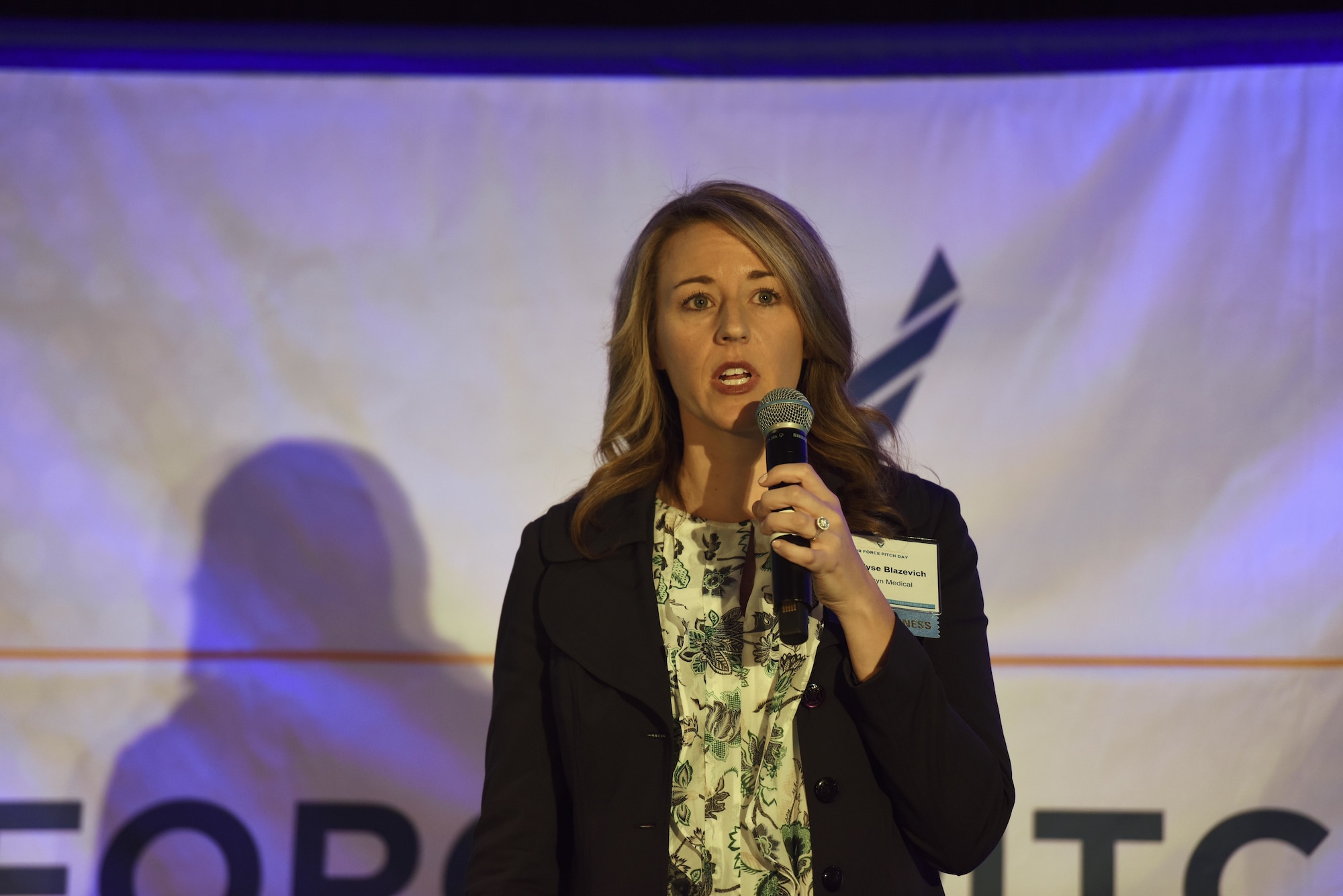 Elyse Blazevich, Securisyn Medical chief operating officer, pitches her product to a crowd of small businesses, venture capitalists and Airmen during the inaugural Air Force Pitch Day in New York, March 7, 2019. Blazevich was awarded a same-day contract with the Air Force. Air Force Pitch Day is designed as a fast-track program to put companies on one-page contracts and same-day awards with the swipe of a government credit card. The Air Force is partnering with small businesses to help further national security in air, space and cyberspace. (U.S. Air Force photo by Tech Sgt. Anthony Nelson Jr.)