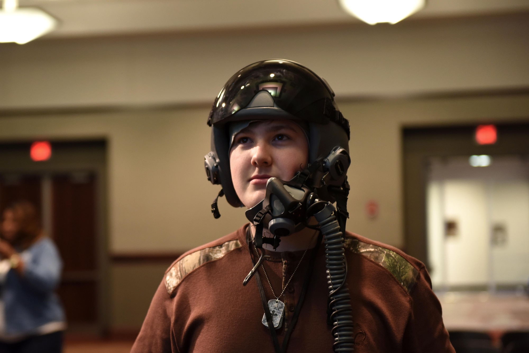 Payne Tomilinson, a Corinth High School student, wears a pilot helmet at Mississippi State University’s Engineering Day March 4, 2019, in Starkville, Mississippi. A three-man team from Columbus Air Force Base connected with over 350 students from Texas, Louisiana, Alabama and Mississippi at the space-