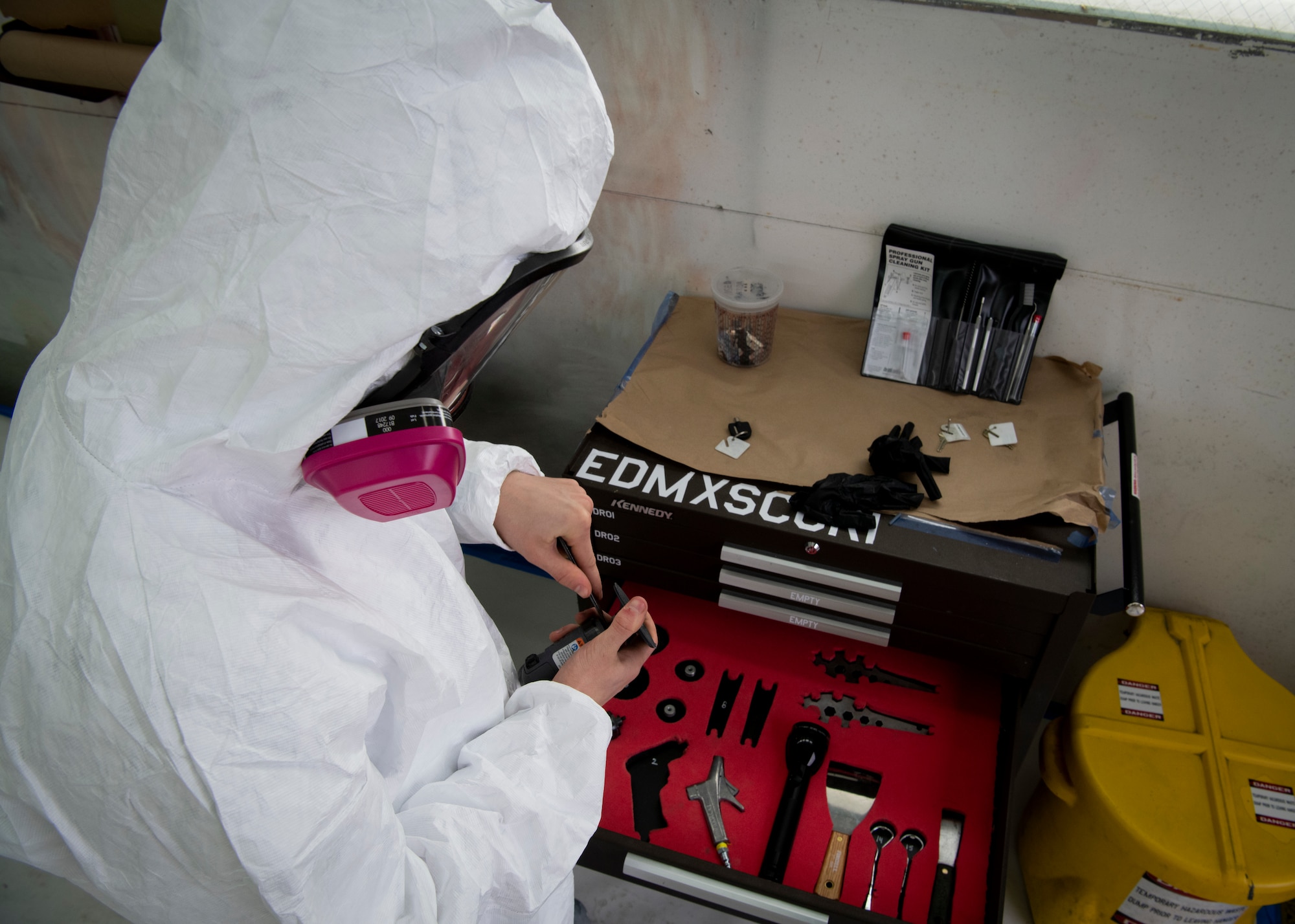 U.S. Air Force Airman 1st Class Evan Green, 33rd Maintenance Squadron Low Observable aircraft structural maintenance journeyman, configures the orbital sander for metal preparation Feb. 21, 2019, at Eglin Air Force Base, Fla. Green is currently assigned to the 33rd MXS Corrosion Control Section where he is expected to learn many different skills including media blasting and painting. (U.S. Air Force photo by Airman 1st Class Daniella Peña-Pavao)