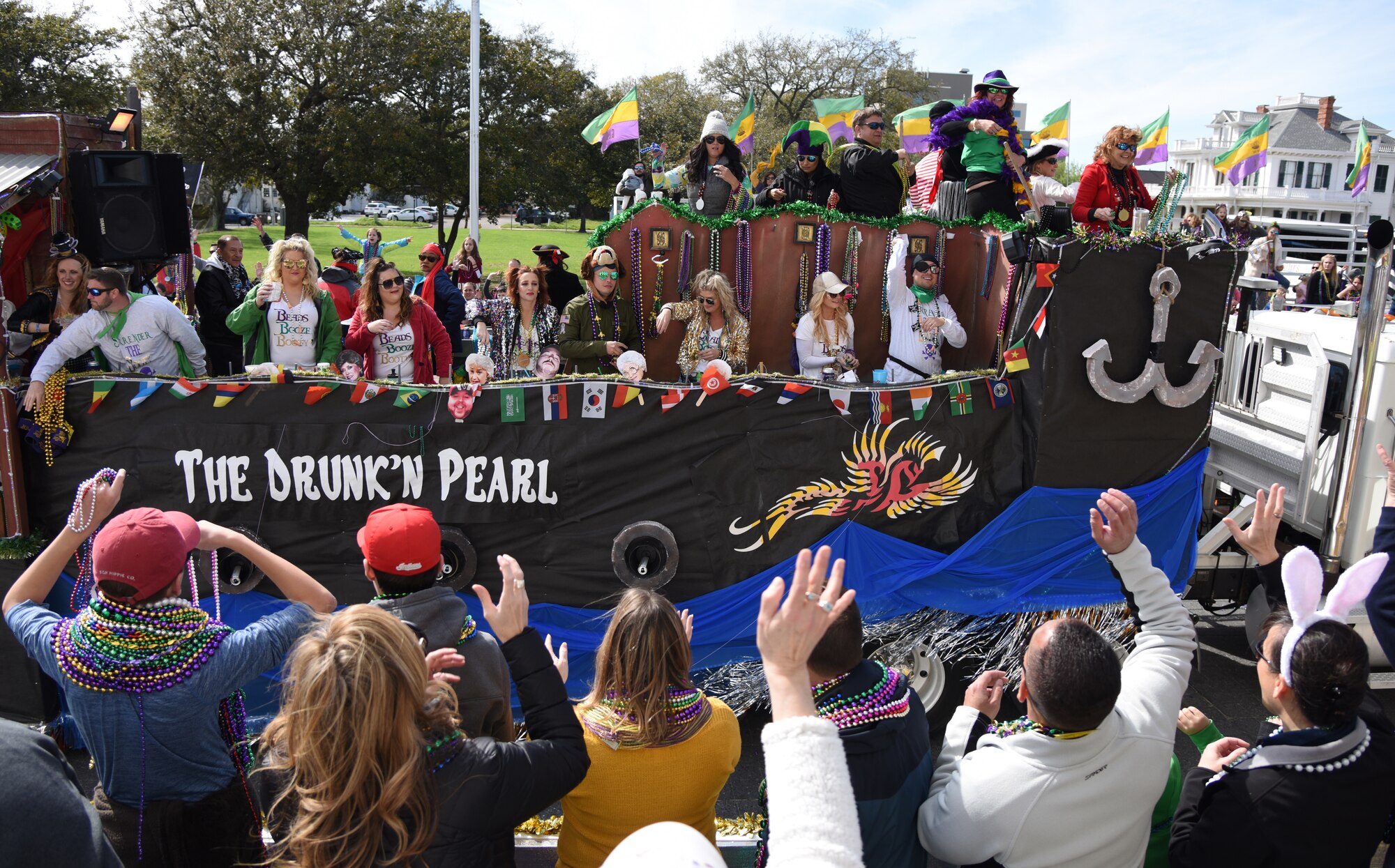 Decorative floats ride through Biloxi during the Gulf Coast Carnival Association Mardi Gras parade in Biloxi, Mississippi, March 5, 2019. Keesler personnel participate in local parades every Mardi Gras season to show their support of the communities surrounding the installation. (U.S. Air Force photo by Kemberly Groue)