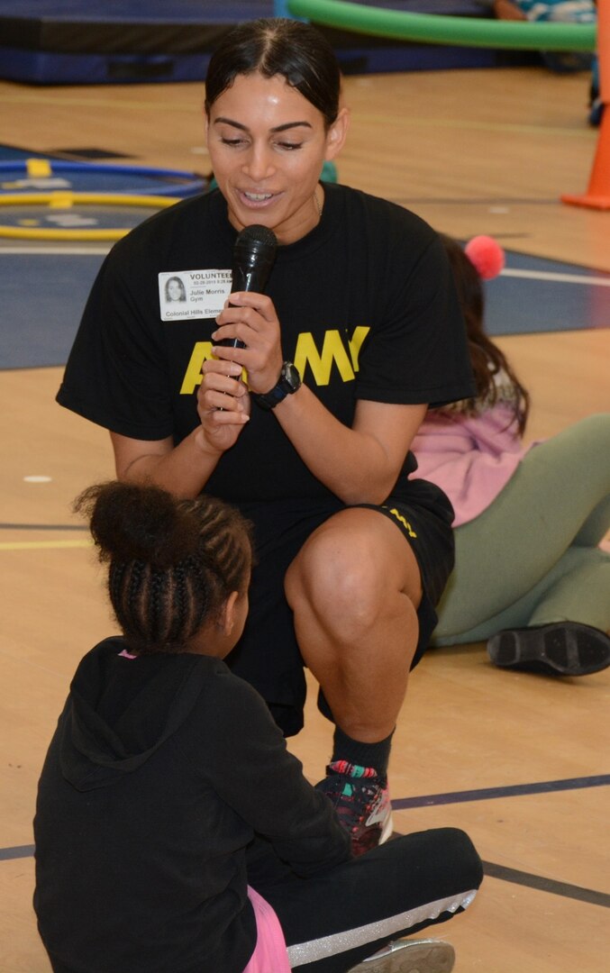 First Sgt. Julie Morris talks a student about the importance of proper nutrition.