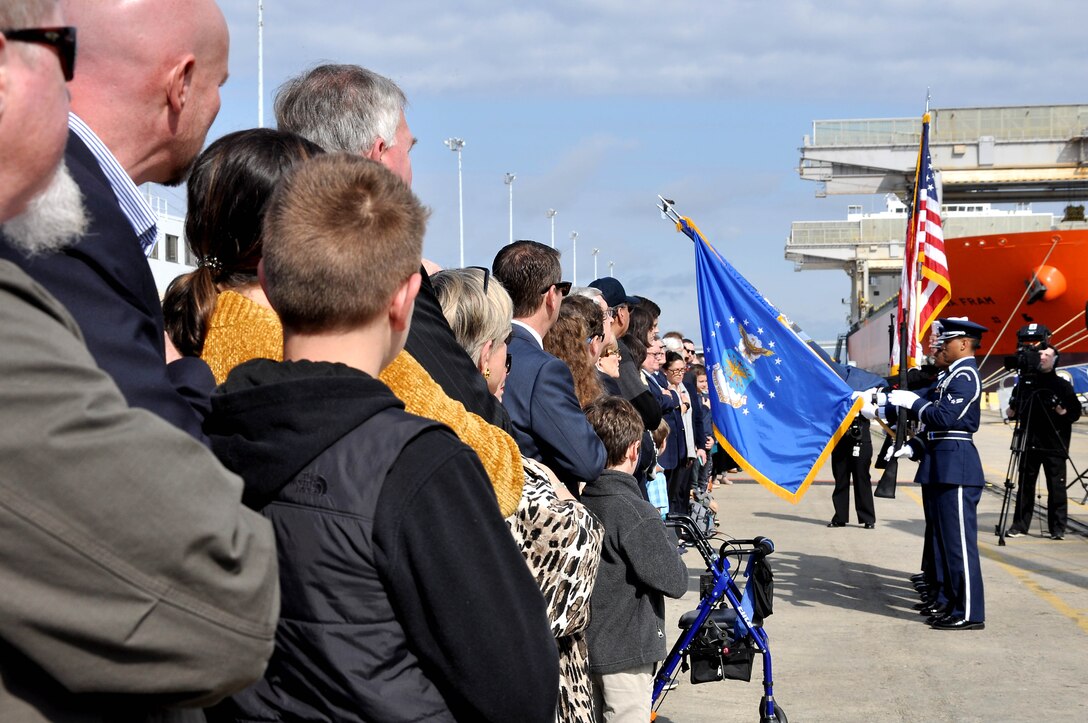 Sailors and Airmen from Joint Base Charleston, South Carolina, present the colors during the commissioning ceremony of the Navy's newest littoral combat ship, USS Charleston (LCS 18).