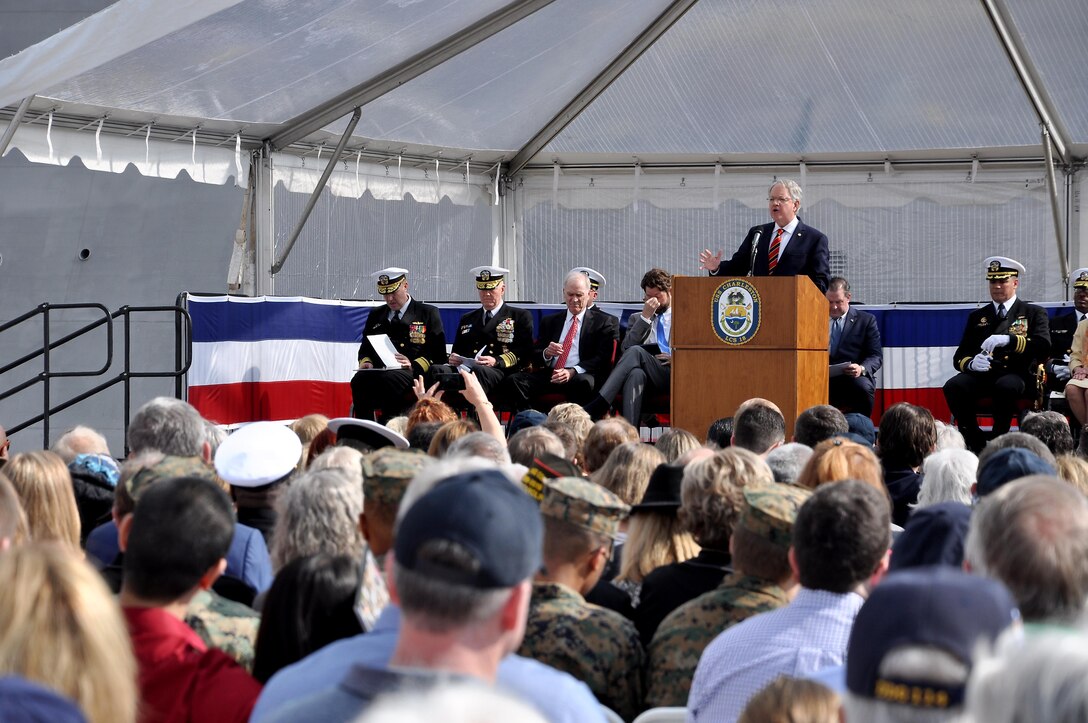 The mayor of Charleston, South Carolina, John J. Tecklenburg, delivers his remarks during the commissioning ceremony of the Navy's newest littoral combat ship, USS Charleston (LCS 18).