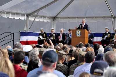 The mayor of Charleston, South Carolina, John J. Tecklenburg, delivers his remarks during the commissioning ceremony of the Navy's newest littoral combat ship, USS Charleston (LCS 18).