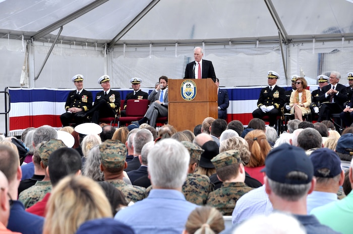 Secretary of the Navy Richard V. Spencer delivers his remarks during the commissioning ceremony of the Navy's newest littoral combat ship, USS Charleston (LCS 18).