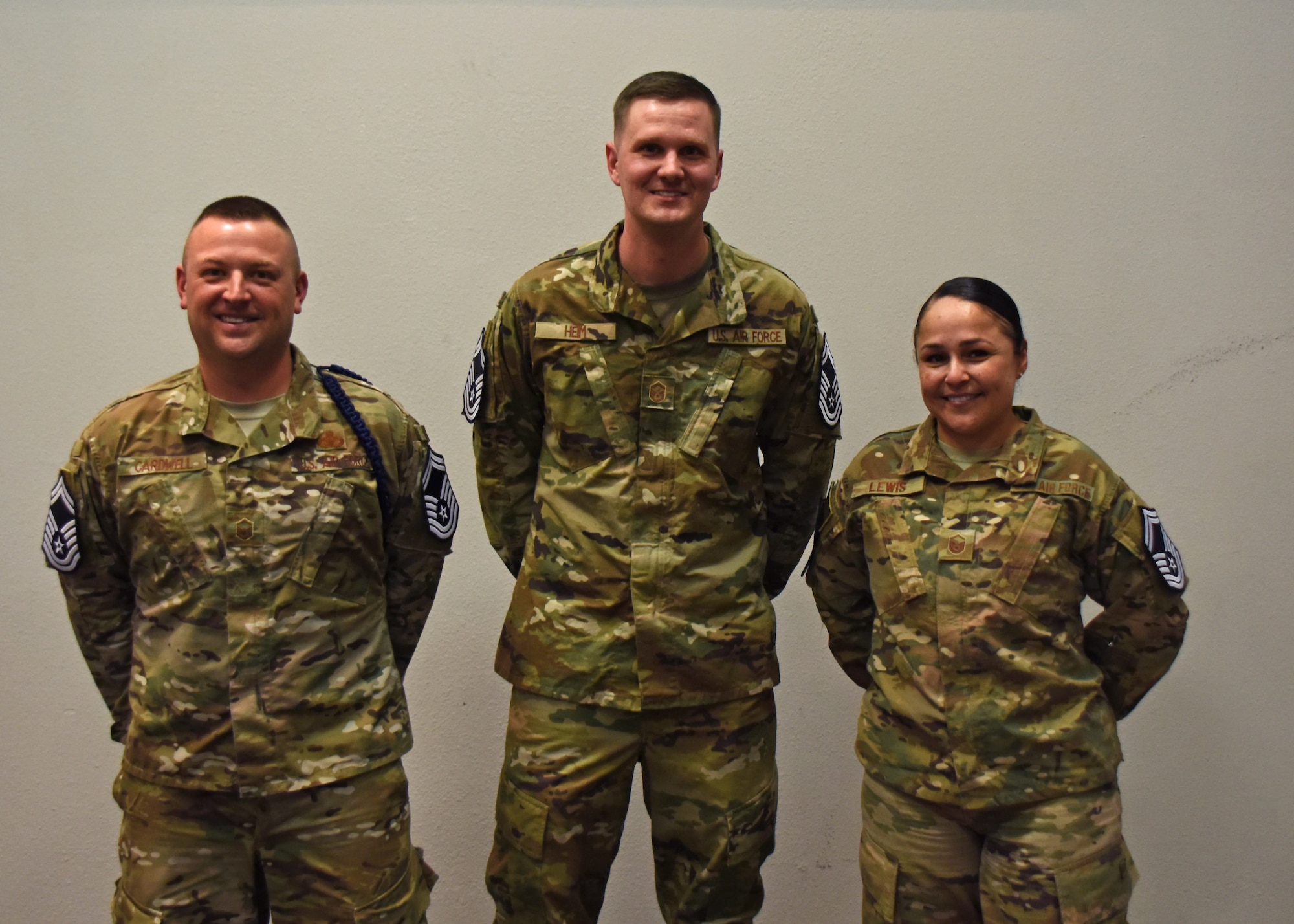 The new U.S. Air Force senior master sergeant selects stand together after the senior master sergeant release celebration at the Event Center on Goodfellow Air Force Base, Texas, March 7, 2019. Within the Air Force, only 10 percent of enlisted members will make it to senior master sergeant. (U.S. Air Force photo by Airman 1st Class Zachary Chapman/Released)