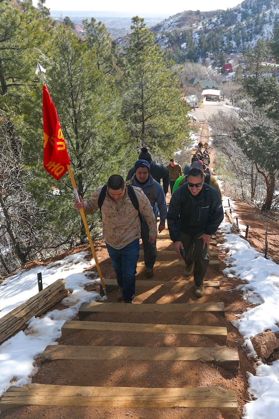 U.S. Marine Corps top performing staff non-commissioned officers and recruiters from the 8th Marine Corps District hike up the Manitou Incline trail in Colorado Springs, Colorado,