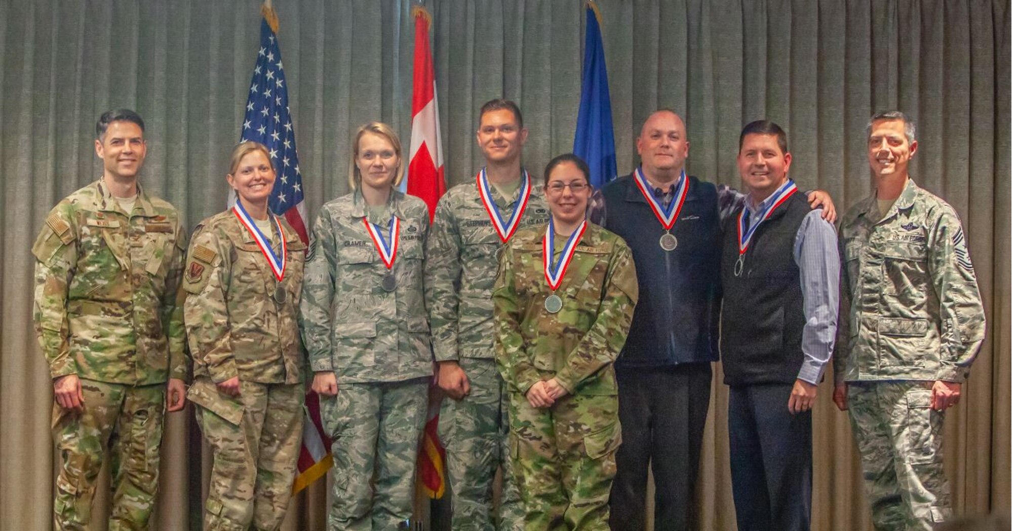 The 2018 552nd Air Control Wing annual award winners pose for a photo Feb. 22, 2019, at the Tinker Event Center. Front row: Col. Geoffrey Weiss, 552nd ACW Commander; Maj. Katherine Onstad; Master Sergeant Mary Cramer; Capt. Sean Stephens; Tech. Sgt. Heather King; Christopher Guth; Patrick Wilson; and Chief Master Sgt. Raymond Mott, 552nd ACW command chief. Missing: Senior Airman Brielle Golden; Senior Master Sgt. Justin Stacey; and Jenny Smith. (U.S. Air Force photo Master Sgt. Michael Remillard).