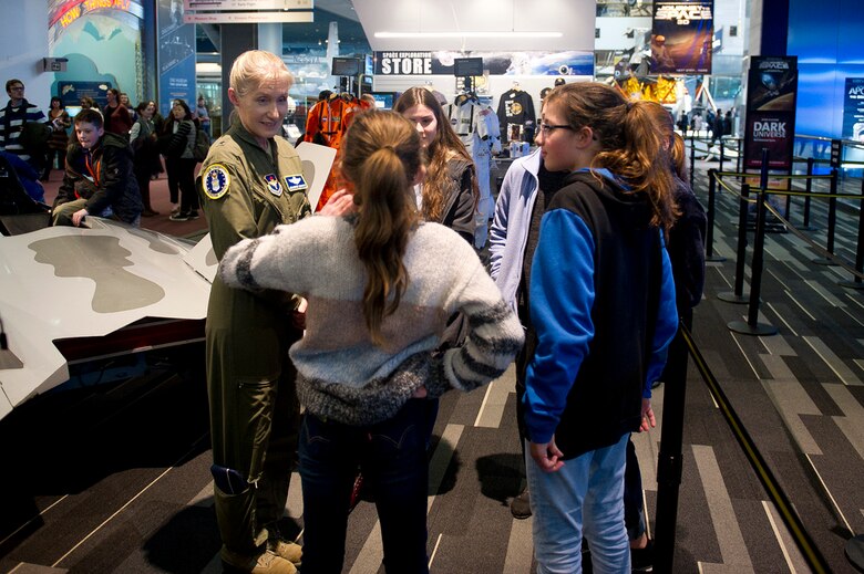 U.S. Air Force Brig. Gen. Jeannie M. Leavitt, Air Force Recruiting Service commander, left, speaks with students during the release of Captain Marvel and Air Force STEM fair at the Smithsonian National Air and Space Museum in Washington D.C., March 7, 2019. (U.S. Air Force photo by Master Sgt. Michael B. Keller)