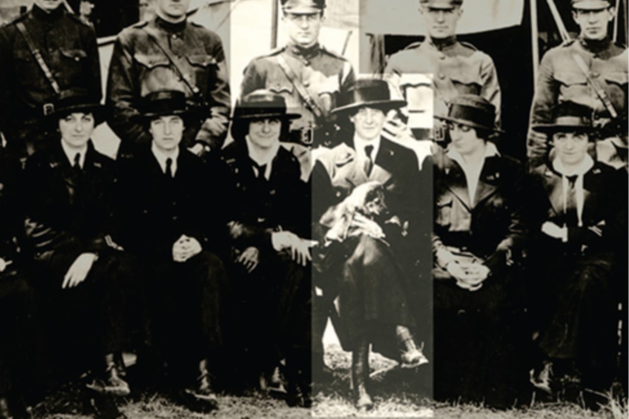 People pose for a group photo in the World War I era.