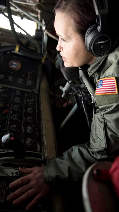 U.S. Air Force Chief Master Sgt. Andrea Inmon, 92nd Operations Group boom operator chief enlisted manager, completes in-flight refueling during an all-woman flight over the Pacific Northwest-area, Mar. 8, 2019. The flight highlighted Team Fairchild women’s ability to complete every aspect of the wing’s mission, providing responsive air refueling and agile combat support across the full range of military operations. (U.S. Air Force photo by Airman 1st Class Whitney Laine)