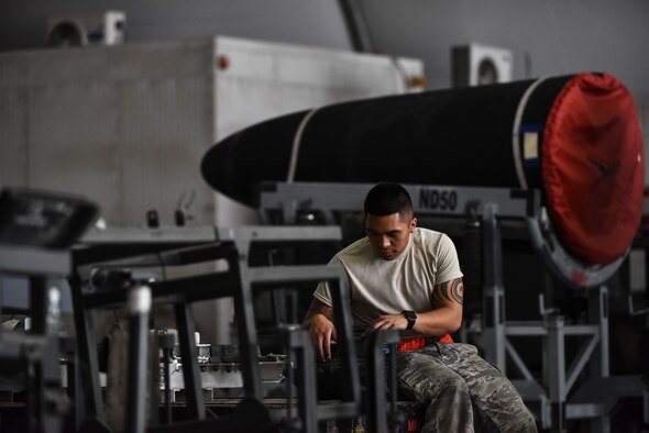 Airman 1st Class Darien Samson, 380th Expeditionary Aircraft Maintenance Squadron avionics technician, reads a technical order at Al Dhafra Air Base, United Arab Emirates, Mar. 6, 2019. The U-2 has served in every American War since the Cold War. (U.S. Air Force photo by Senior Airman Mya M. Crosby)