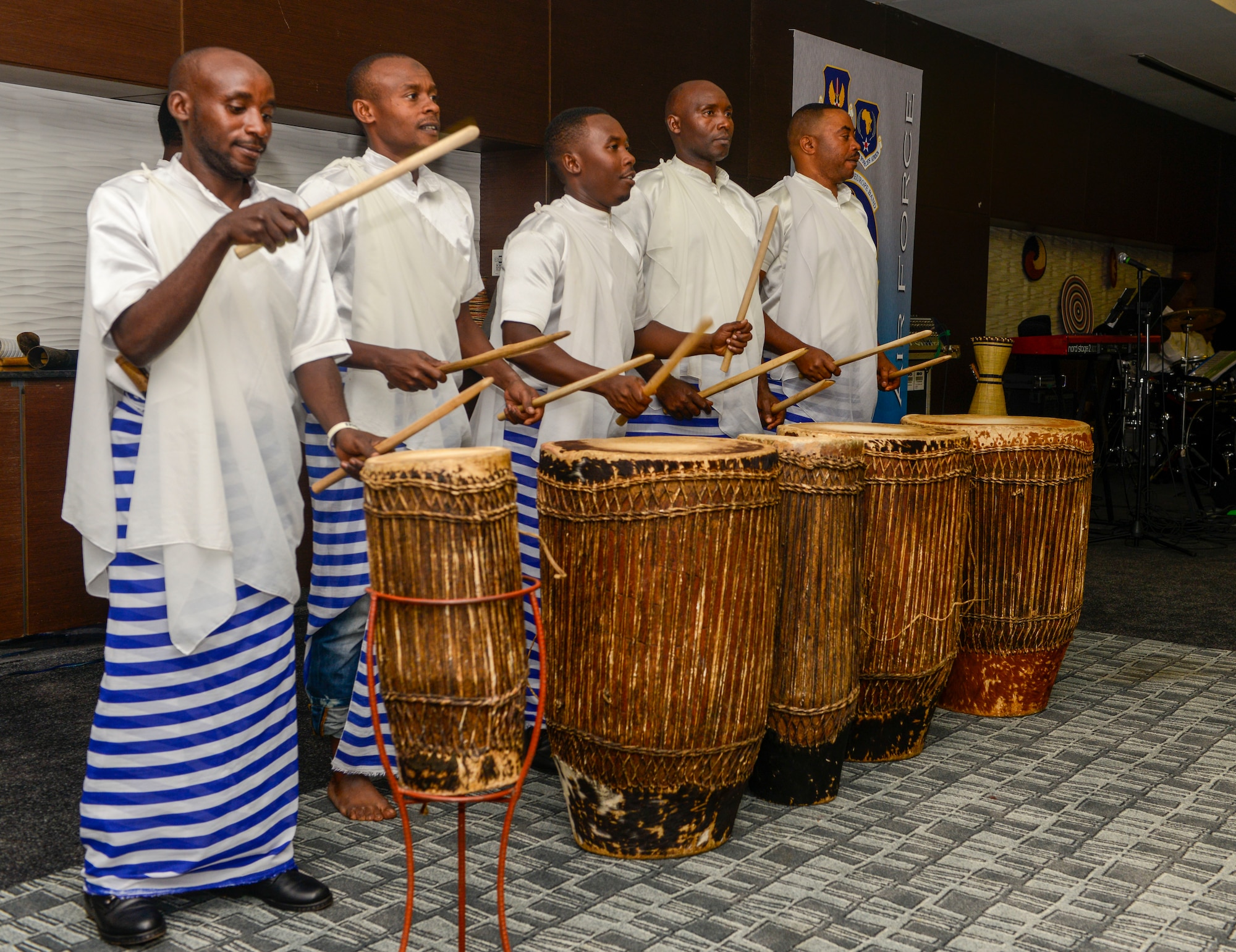 Rwandan artists with LEAF Community Arts play traditional Rwandan music during an African Partnership Flight Rwanda cultural dinner in Kigali, Rwanda, March 7, 2019. APF Rwanda focused on flight, ground, and weapons safety, but it also allowed it participants the opportunity to experience the cultures of the participating nations. (U.S. Air Force photo by Tech. Sgt. Timothy Moore)