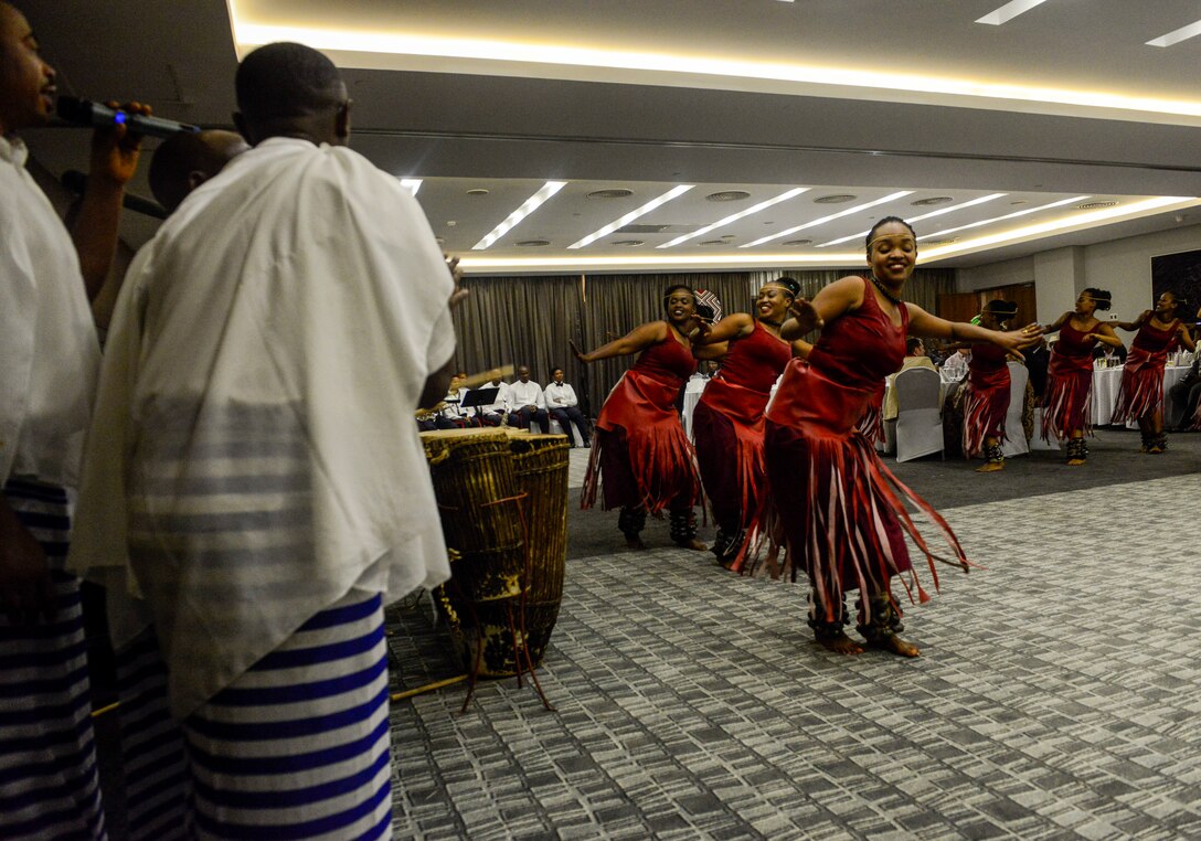 Rwandan artists with LEAF Community Arts perform a traditional Rwandan dance during an African Partnership Flight Rwanda cultural dinner in Kigali, Rwanda, March 7, 2019. APF Rwanda focused on flight, ground, and weapons safety, but it also allowed its participants the opportunity to experience the cultures of the participating nations. (U.S. Air Force photo by Tech. Sgt. Timothy Moore)