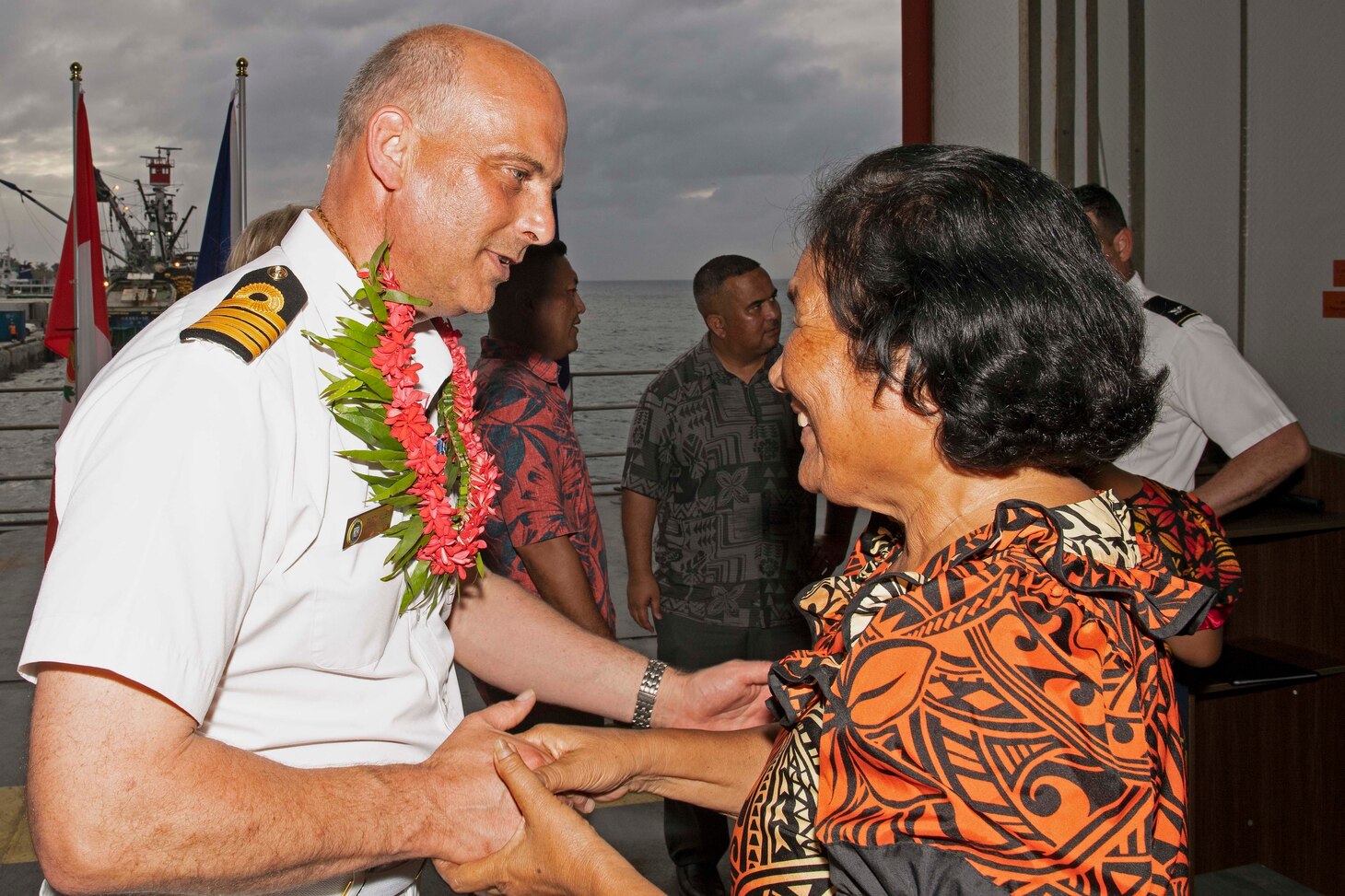 Republic of the Marshall Islands (March 11, 2019) A representative of the Majuro Mejen Armij places a lei on Royal Navy Capt. Paddy Allen, director of mission, following the opening ceremony aboard the Military Sealift Command fast transport ship USNS Brunswick (T-EPF 6). Pacific Partnership, now in its 14th iteration, is the largest annual multinational humanitarian assistance and disaster relief preparedness mission conducted in the Indo-Pacific. Each year, the mission team works collectively with host and partner nations to enhance regional interoperability and disaster response capabilities, increase stability and security in the region, and foster new and enduring friendships in the Indo Pacific.
