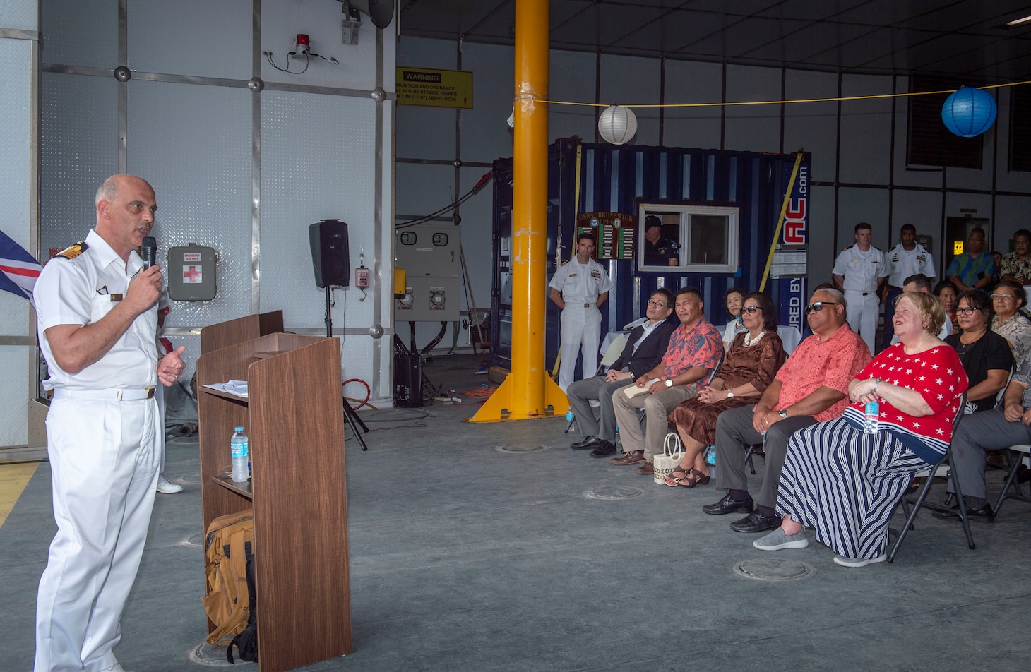 Republic of the Marshall Islands (March 11, 2019) – Royal Navy Capt. Paddy Allen, director of mission for Pacific Partnership 2019, gives opening remarks during the opening ceremony aboard the Military Sealift Command expeditionary fast transport ship USNS Brunswick (T-EPF 6). Pacific Partnership, now in its 14th iteration, is the largest annual multinational humanitarian assistance and disaster relief preparedness mission conducted in the Indo-Pacific. Each year, the mission team works collectively with host and partner nations to enhance regional interoperability and disaster response capabilities, increase stability and security in the region, and foster new and enduring friendships in the Indo Pacific.