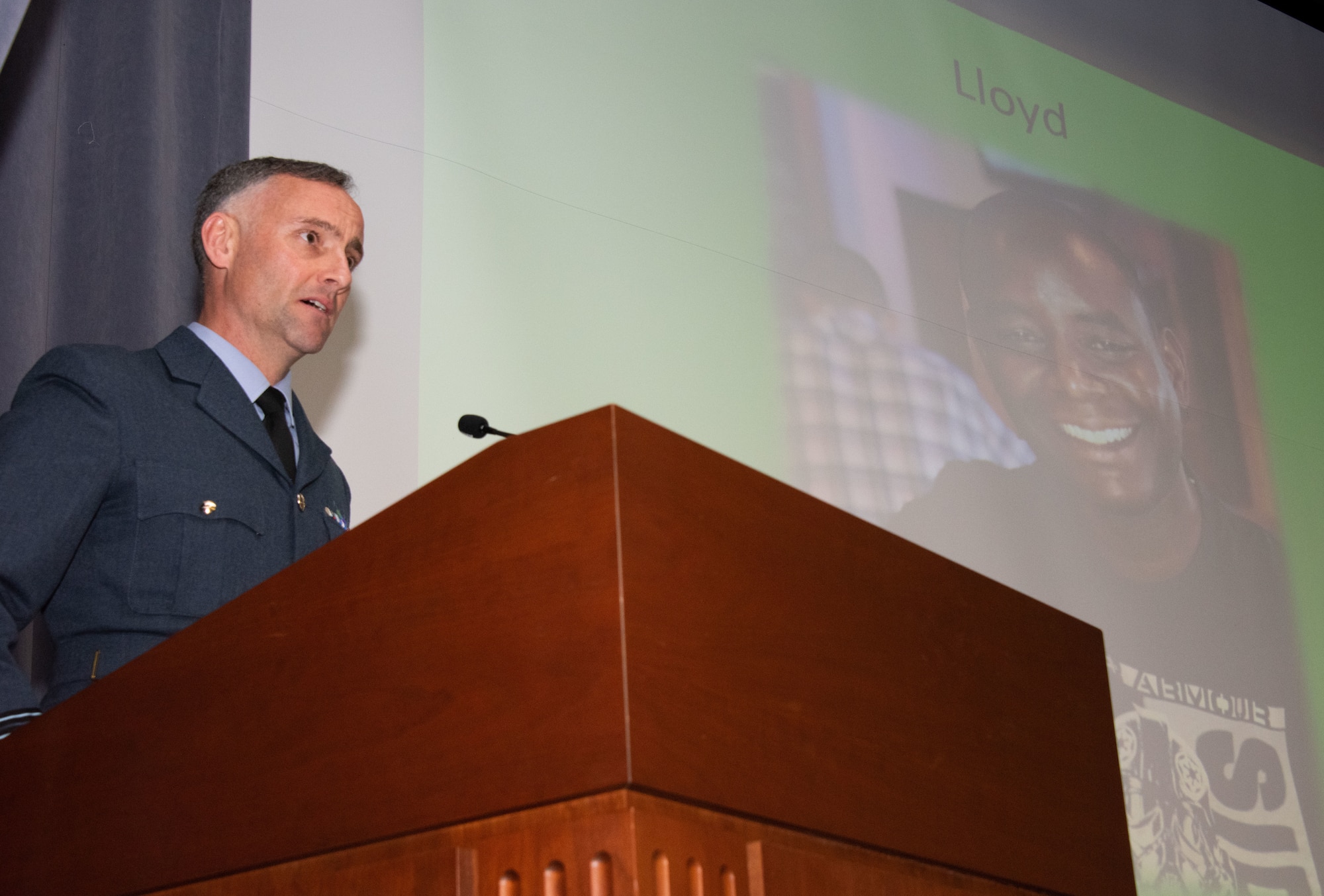 Royal Air Force Wing Commander Stuart Clark, international officer class president, spoke about the tight-knit family formed among students at Air Command and Staff College and what it meant to lose Zambian air force Maj. Bweendo “Lloyd” Malawo during a memorial service March 8. Malawo had been a student of Air University’s ACSC and International Officer School since May of 2018, and was killed March 2 in a hit and run in Millbrook, Alabama. (U.S. Air Force photo by Melanie Rodgers Cox)