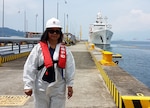 woman standing on a boat pier