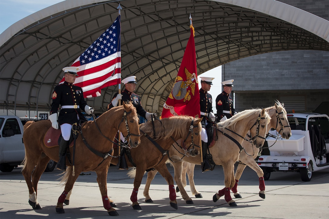 Marines participate in an opening ceremony.