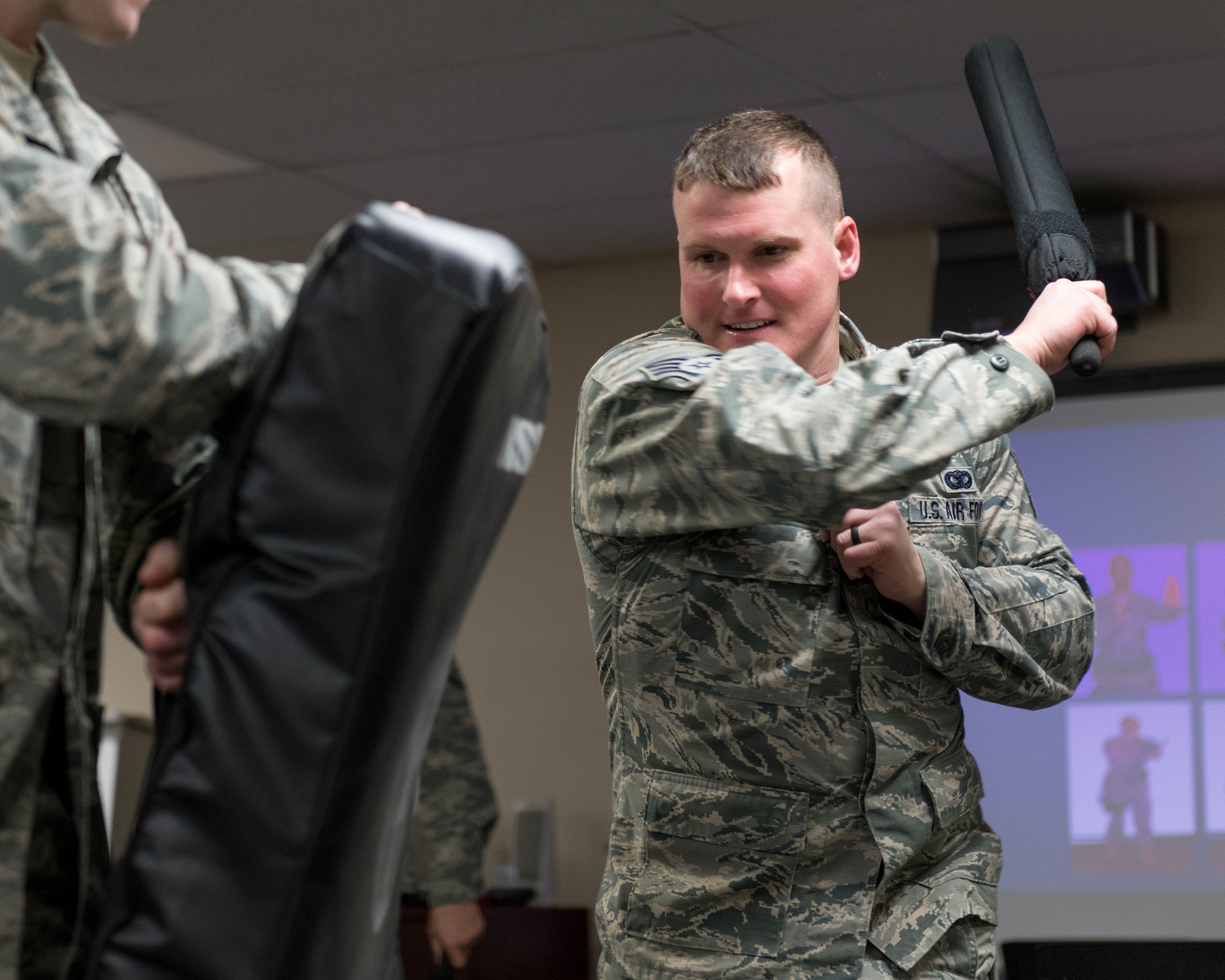 Staff Sgt. David Luke, a fireteam member from the 910th Security Forces Squadron, practices a forward strike on a sparring pad March 10, 2018, in the old Combat Arms Training and Maintenance building here.