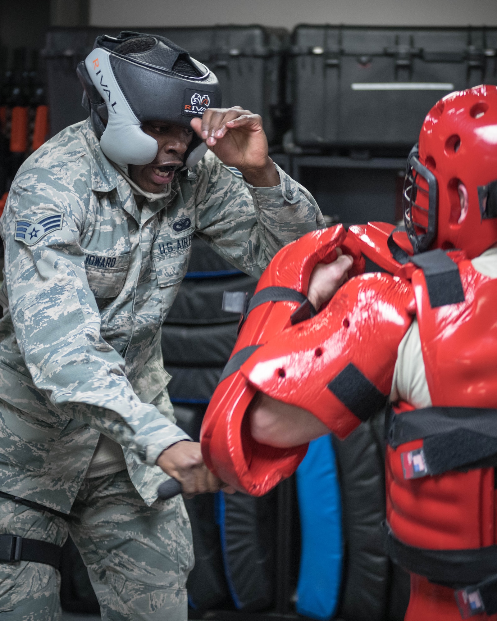 Senior Airman Eusevius Howard, a fireteam member assigned to the 910th Security Forces Squadron, spars with Master Sgt. Michael Skraba, the training program manager for the 910th SFS, during a “Red-Man” examination.