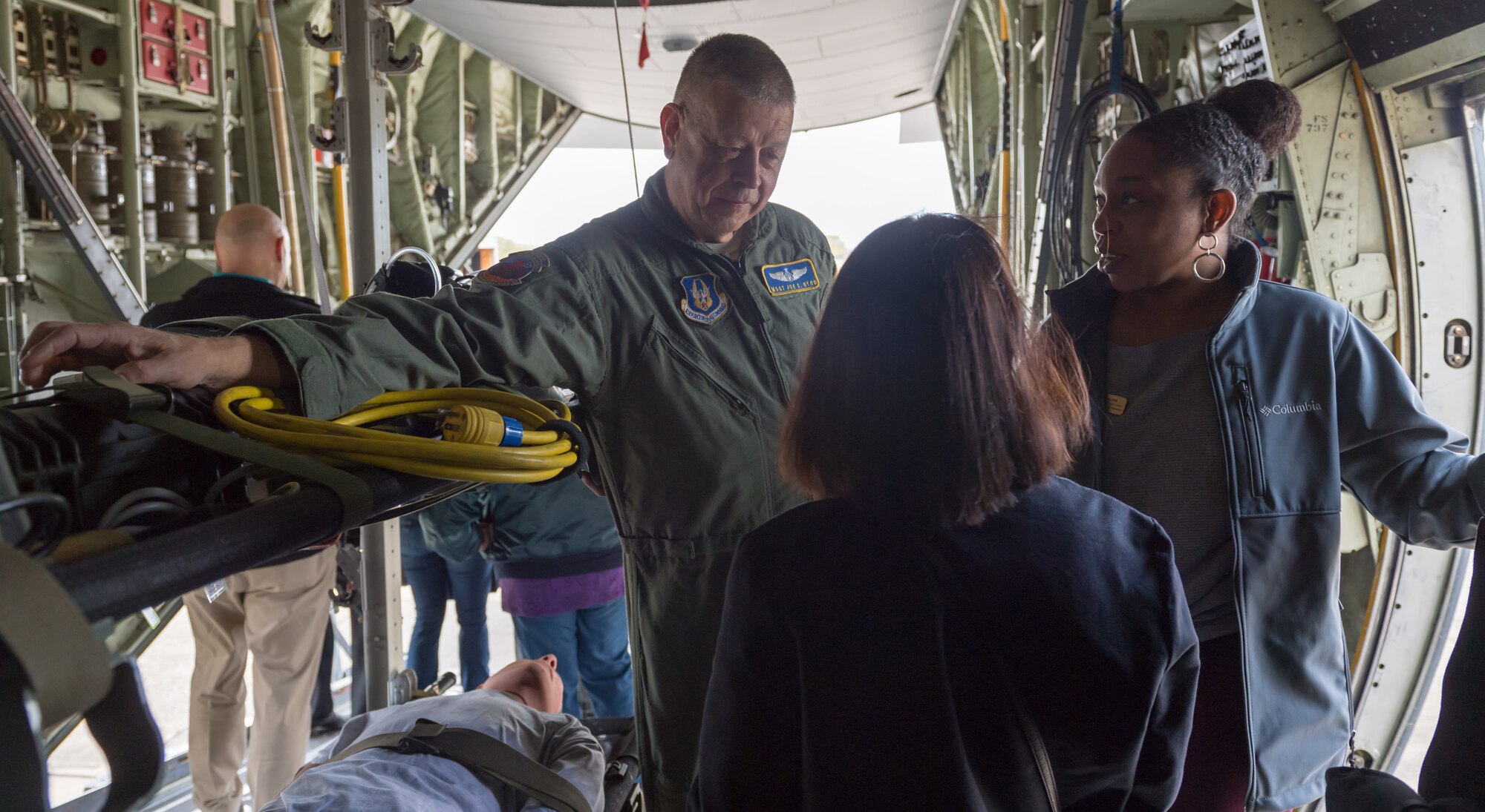 U.S. Air Force Master Sgt. Joe Byrd, 36th Aeromedical Evacuation Squadron aeromedical technician, discusses on-board medical procedures to Keesler honorary commanders inside a WC-130J Hercules during the 403rd Wing Honorary Commanders Tour at Keesler Air Force Base, Mississippi, March 08, 2019. The tour was intended to familiarize honorary commanders with the 403rd Wing and the Air Force Reserve mission and capabilities. The event also included an incentive flight on a WC-130J Hercules. (U.S. Air Force Photo by Andre' Askew)