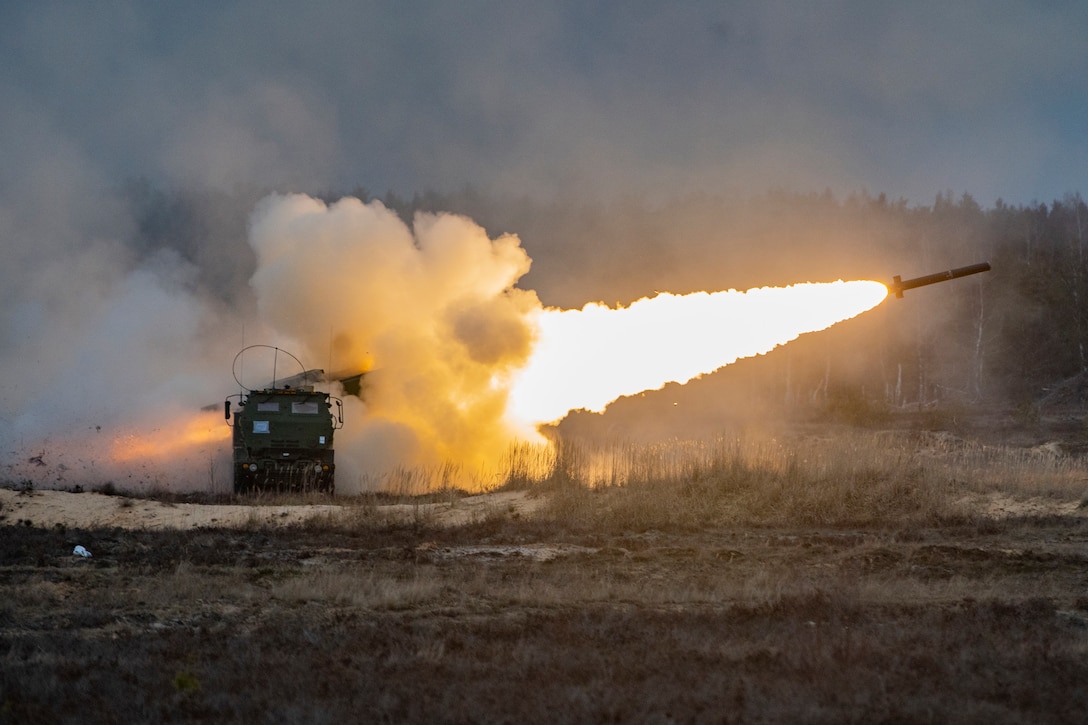 A missile launches from a rocket system.