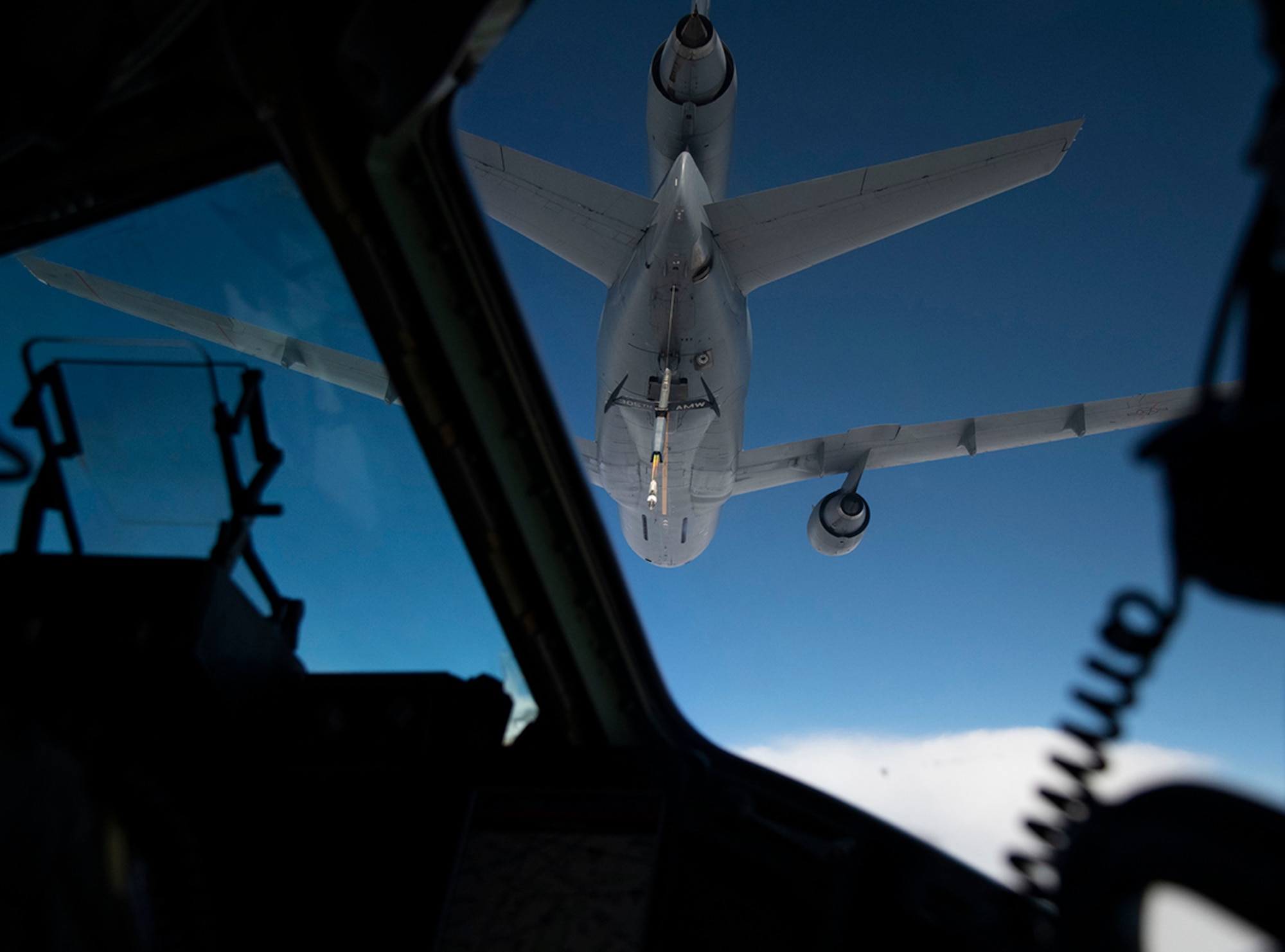 A KC-10 Extender with the 305th Air Mobility Wing from Joint Base McGuire-Dix-Lakehurst, N.J., prepares to refuel a C-17 Globemaster III during Exercise Jersey Devil 19, March 4, 2019. Aircraft from Dover Air Force Base, Del., and Joint Base MDL participated in the exercise to include the C-5M Supergalaxy, KC-10 Extender and C-17 Globemaster III. (U.S. Air Force photo by Airman 1st Class Zoe M. Wockenfuss)