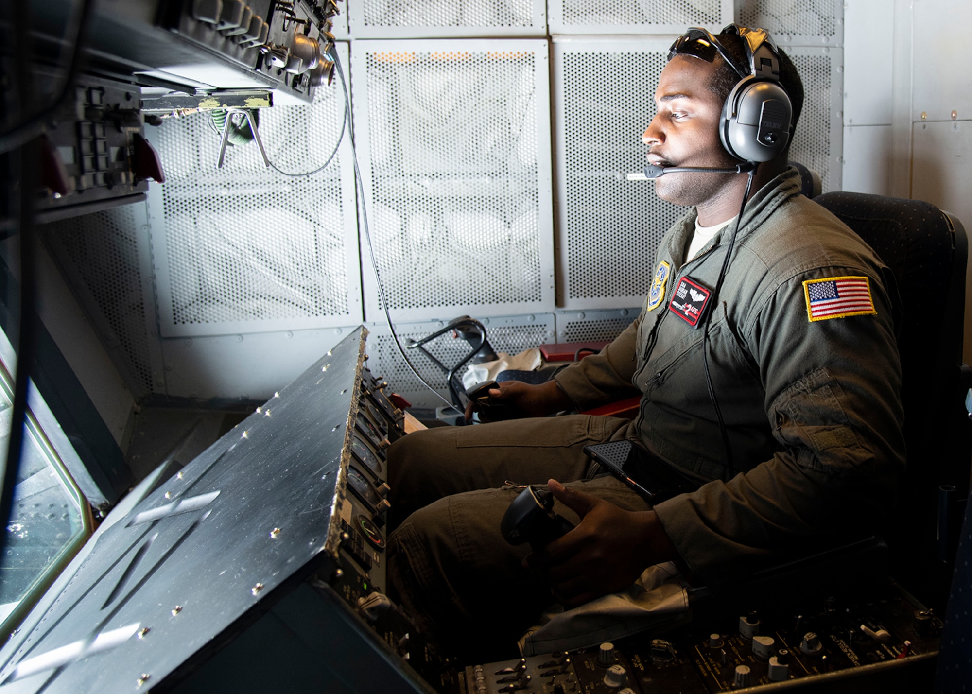 Senior Airman Dorian Cozart, boom operator with the 2nd Air Refueling Squadron, operates the boom on a KC-10 Extender March 7, 2019, during Exercise Jersey Devil 19. Jersey Devil was aimed at preparing Airmen to respond to complex threats anywhere, anytime. (U.S. Air Force photo by Airman 1st Class Zoe M. Wockenfuss)