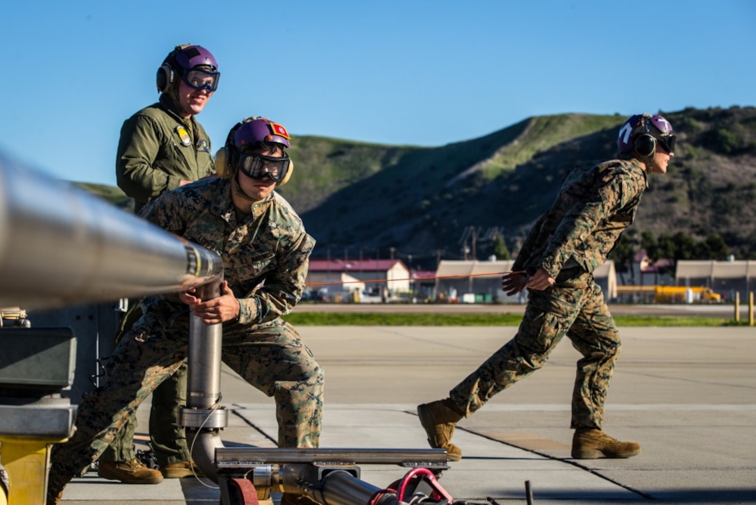 Johnathan Brewer, Lance Cpl. Alex Lopez,  and Lance Cpl. Chance Rogers show their aircraft refueling skills aboard Marine Corps Air Station Camp Pendleton. The Marines in the fuels Department dedicate endless hours to keep the mission of the Air Station in full force and aircraft flying safely filled tanks.