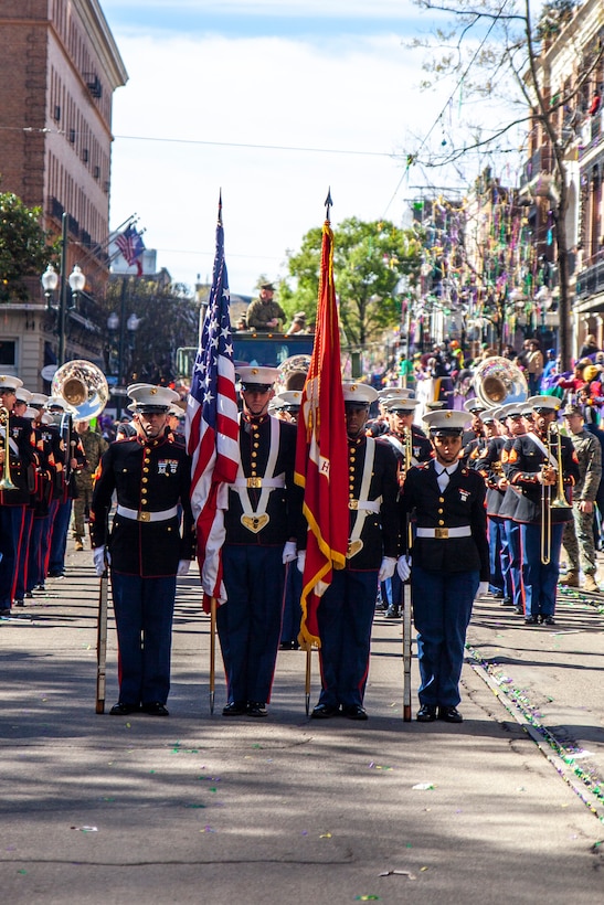 The Marine Forces Reserve color guard stands at attention during the Mardi Gras Zulu Parade in New Orleans, March 5, 2019.