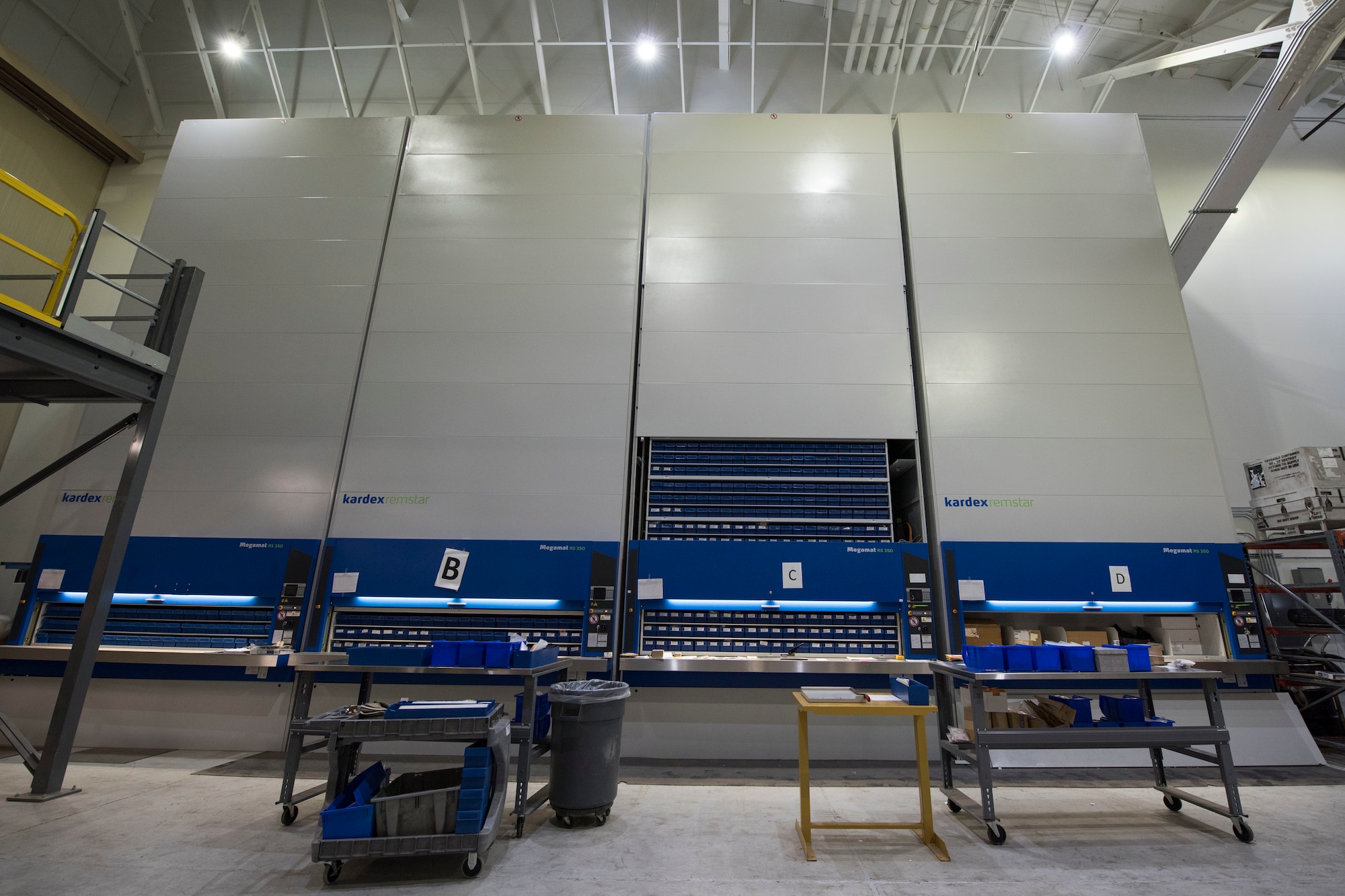 A newly constructed three-story vertical mechanized parts storage system is installed in the newly remodeled 24/7 aircraft parts store March 8, 2019, at Joint Base Elmendorf-Richardson, Alaska. In one of the newest total force integration associations of its kind, the 673d LRS Materiel Management flight is conducting a complete C-17 aircraft supply turnover to the 176th LRS. A remodel of both a warehouse and a newly renovated 24/7 aircraft parts store was conducted to take on the massive amount of inventory.