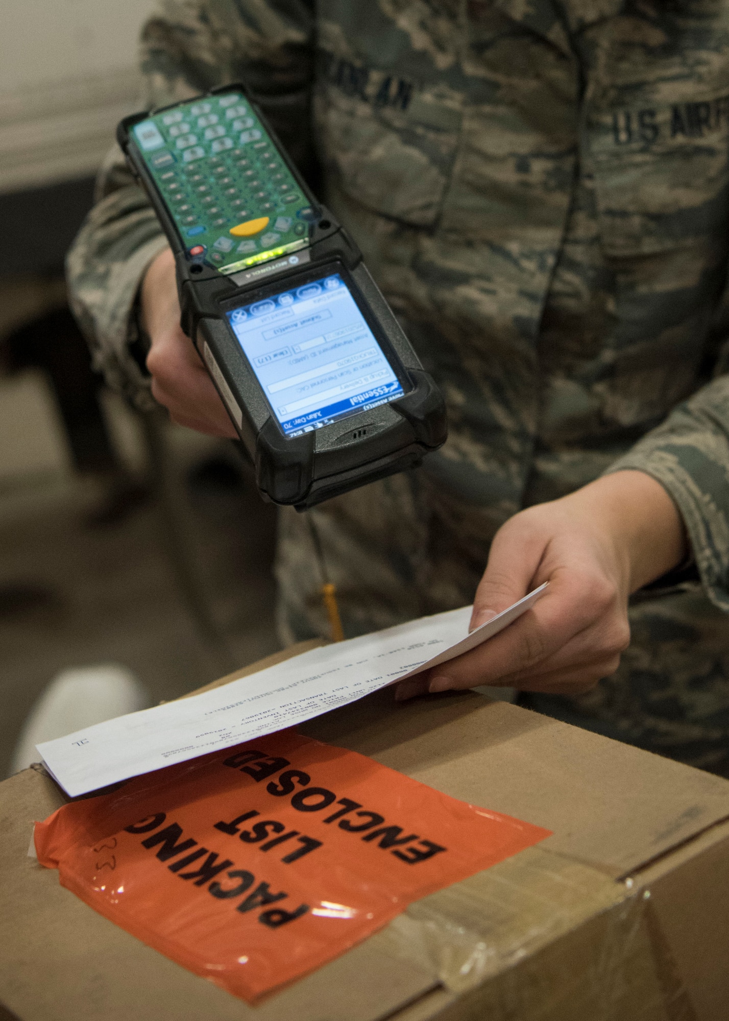 Alaska Air National Guard Airman 1st Class Lauren Scanlan, 176th Logistics Readiness Squadron ground transportation, scans a shipment order for delivery, March 11, 2019, at Joint Base Elmendorf-Richardson, Alaska. In one of the newest total force integration associations of its kind, the 673d Logistics Readiness Squadron Materiel Management flight is conducting a complete C-17 aircraft supply turnover to the Alaska ANG 176th LRS.