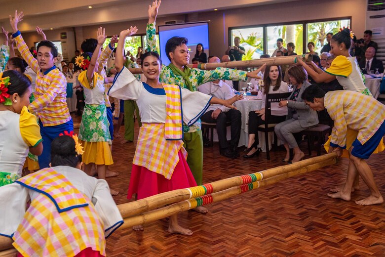 Tacloban City, Philippines – Leyte Kalipayan Dance Company members perform traditional songs and dances during the Pacific Partnership 2019 Opening Ceremony. Pacific Partnership, now in its 14th iteration, is the largest annual multinational humanitarian assistance and disaster relief preparedness mission conducted in the Indo-Pacific. Each year the mission team works collectively with host and partner nations to enhance regional interoperability and disaster response capabilities, increase security and stability in the region, and foster new and enduring friendships in the Indo-Pacific.