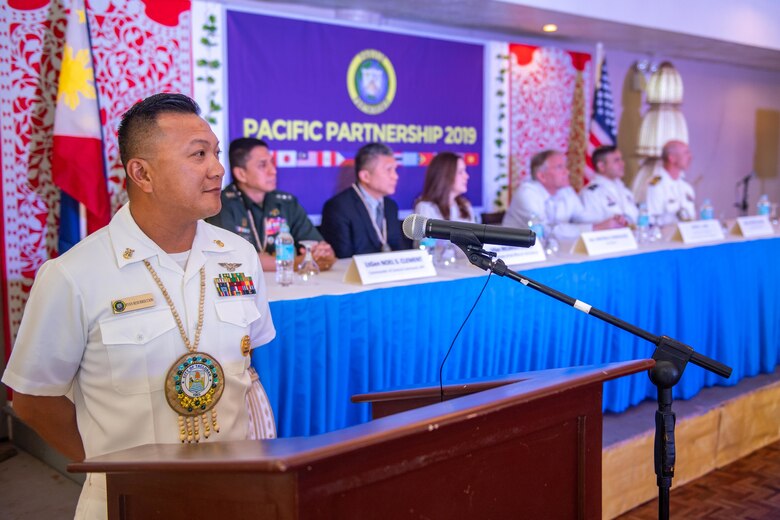 Tacloban City, Philippines – Command Master Chief Ryan Resurreccion serves as master of ceremonies during the Pacific Partnership 2019 Opening Ceremony. Pacific Partnership, now in its 14th iteration, is the largest annual multinational humanitarian assistance and disaster relief preparedness mission conducted in the Indo-Pacific. Each year the mission team works collectively with host and partner nations to enhance regional interoperability and disaster response capabilities, increase security and stability in the region, and foster new and enduring friendships in the Indo-Pacific.