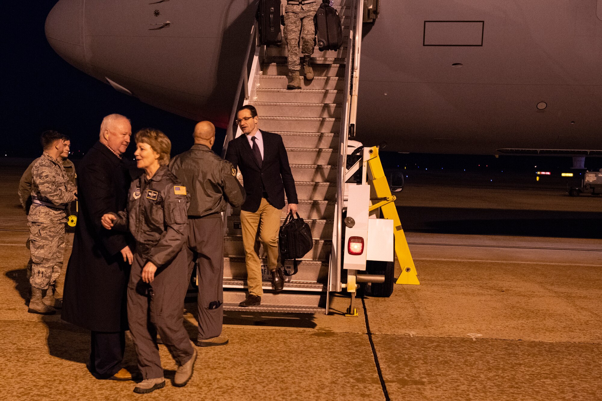 ALTUS AIR FORCE BASE, Okla. - Dr. Will Roper, Assistant Secretary of the Air Force for Acquisition, is greeted by Col. Eric Carney, 97th Air Mobility Wing commander, March 11, 2019 during the delivery of the third KC-46 Pegasus aircraft to Altus.