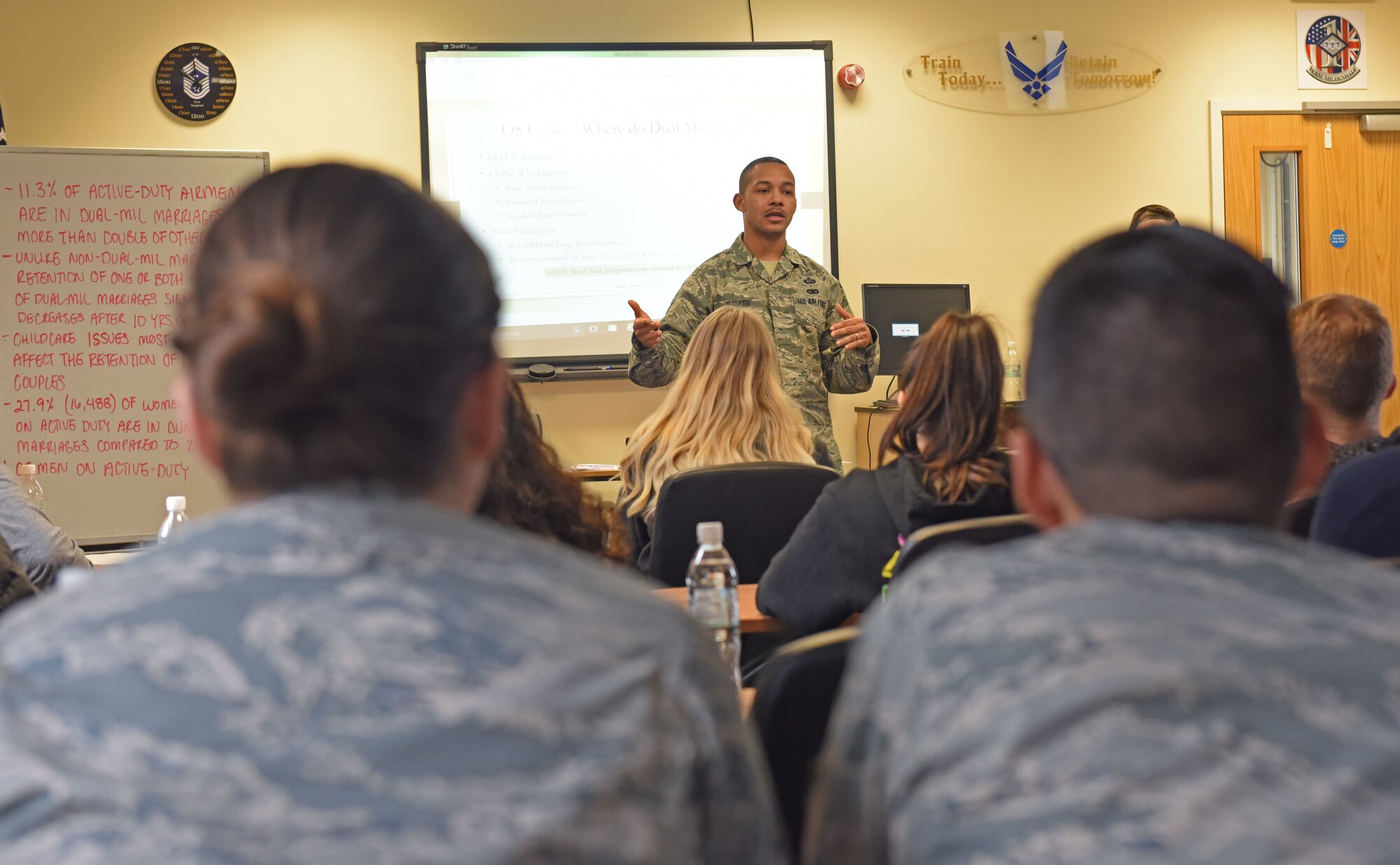 U.S. Air Force Master Sgt. Abraham Walker, 100th Force Support Squadron career development section chief, gives a brief during a dual-military seminar at RAF Mildenhall, England, March 8, 2019. The seminar included lectures on dual-military assignments and “The 5 Love Languages” to help dual-military members with any issues they may encounter during their career. (U.S. Air Force photo by Senior Airman Luke Milano)