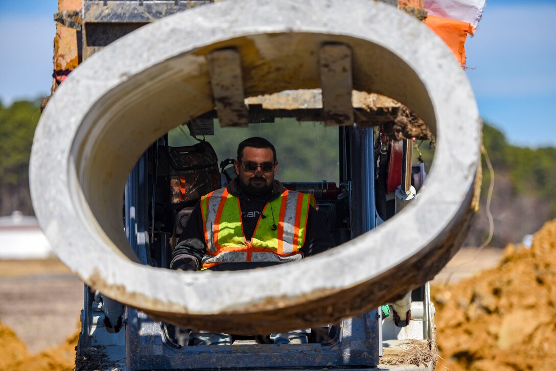 An Aspen Construction worker operates a forklift at Joint Base Langley-Eustis, Virginia, March 7, 2019.