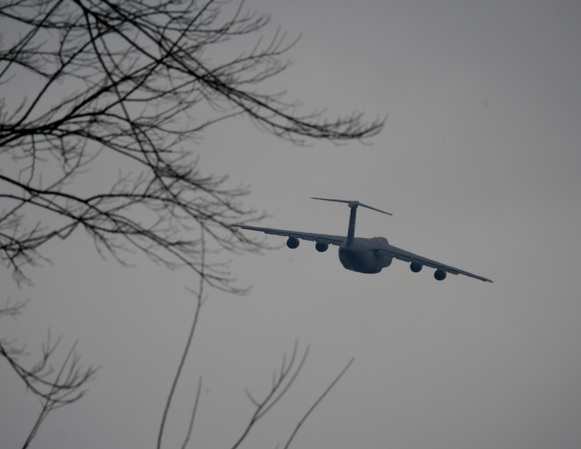A C-5 aircraft makes a banking turn of approximately 15 degrees as it lifts off from training with the 932nd Airlift Wing March 2, 2019 at Scott Air Force Base, Illinois.  The 932nd Aeromedical Evacuation Squadron took part in a C-5M Super Galaxy patient evacuation training with the 142nd Aeromedical Evacuation Squadron, visiting from New Castle Air National Guard Base, Delaware, at Scott AFB, Illinois, March 2.

The training consisted of setting up litters on the back of seats and in the cargo hold. Only three AES’s have been certified in the C-5 patient evacuation training. C-5 training prepares units who are uncertified to do aeromedical evacuations and to be one step closer to completing the training. 

“Our prime aircrafts are C-130, KC-135 and C-17,” said Senior Master Sgt. Tonya Hupp, 932nd AES Operations Superintendent. “The C-5 is our opportune aircraft that we can move patients in the event that we are needed, if there were a mass casualty.”  (U.S. Air Force photo by Lt. Col. Stan Paregien)