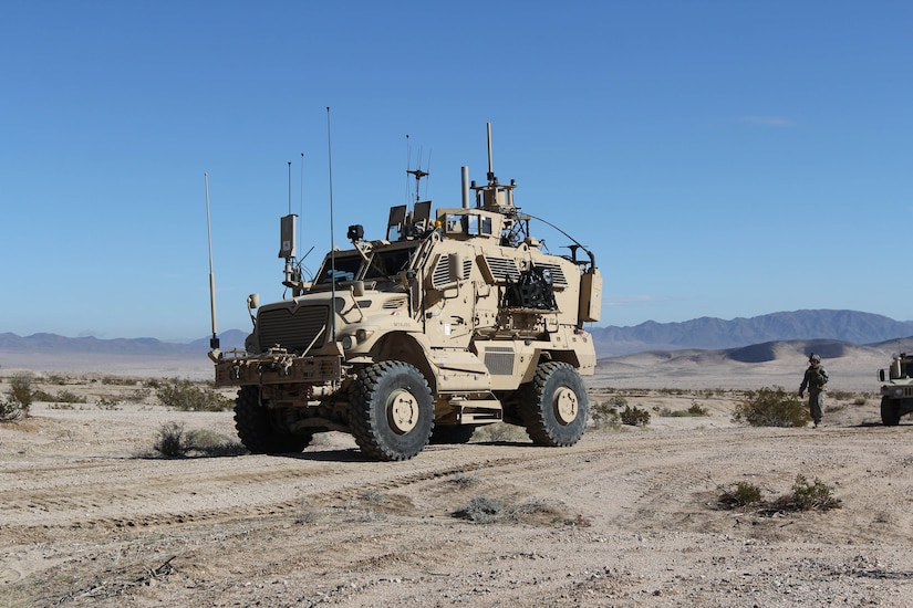 Tactical vehicle moves through desert