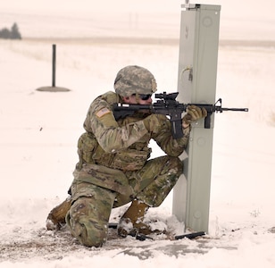 Sgt. Sol Griffith, a fire team leader assigned to the Wyoming Army National Guard’s C Company, 1st Battalion, 297th Infantry Regiment (Forward), demonstrates the proposed new rifle marksmanship evaluation, from the kneeling supported position. The deploying infantry unit was the first to try out the new test at Camp Guernsey, during mobilization training March 7, 2019.