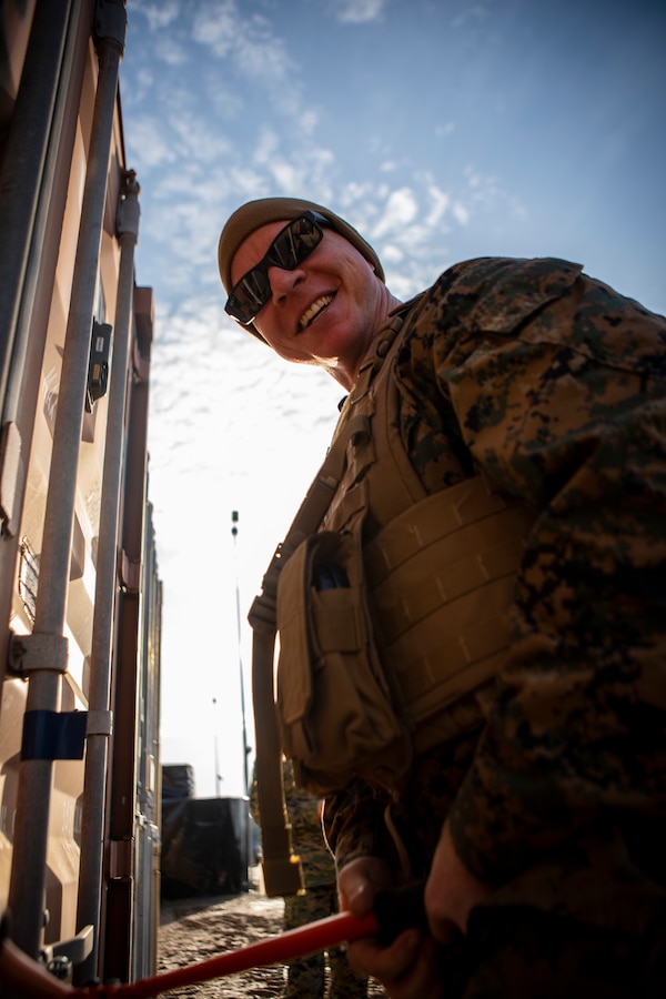 Warrant Officer Randall J. Walker, an explosive ordnance disposal officer attached to Headquarters Battery, 14th Marine Regiment, 4th Marine Division opens a shipping container with ammunition in support of exercise Dynamic Front 19 at Adazi Training Area, Latvia, Feb. 27, 2019. Approximately 3,200 participants from 27 nations will take part in the live-fire portion of exercise Dynamic Front 19, March 2-9, 2019, at the U.S.Army's Grafenwoehr Training Area, Germany; as well as in Riga, Latvia; and Torun, Poland. (U.S. Marine Corps photo by Sgt. Andy O. Martinez)