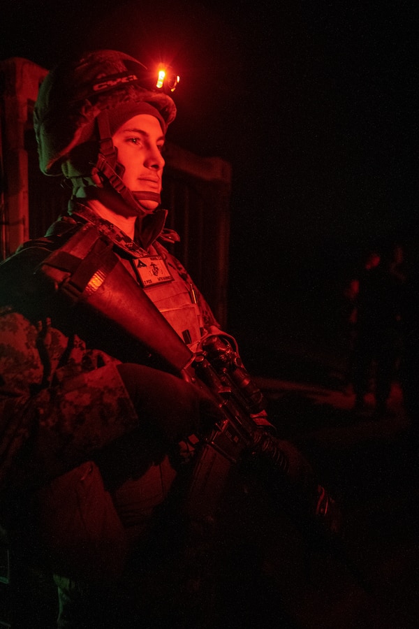 A Marine with 14th Marine Regiment, 4th Marine Division guards the command and control center at Adazi Training Area, Latvia, Feb. 27, 2019. Approximately 3,200 participants from 27 nations will take part in the live-fire portion of exercise Dynamic Front 19, March 2-9, 2019, at the U.S.Army's Grafenwoehr Training Area, Germany; as well as in Riga, Latvia; and Torun, Poland. (U.S. Marine Corps photo by Sgt. Andy O. Martinez)