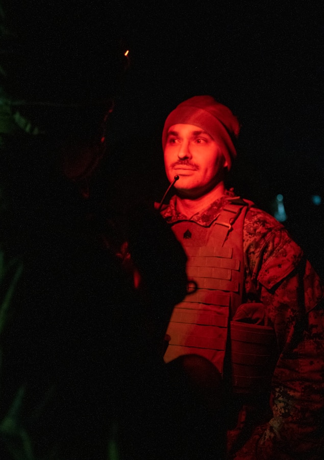 A Marine with 14th Marine Regiment, 4th Marine Division asks for entry to the command and control center at Adazi Training Area, Latvia, Feb. 27, 2019. Approximately 3,200 participants from 27 nations will take part in the live-fire portion of exercise Dynamic Front 19, March 2-9, 2019, at the U.S.Army's Grafenwoehr Training Area, Germany; as well as in Riga, Latvia; and Torun, Poland. (U.S. Marine Corps photo by Sgt. Andy O. Martinez)